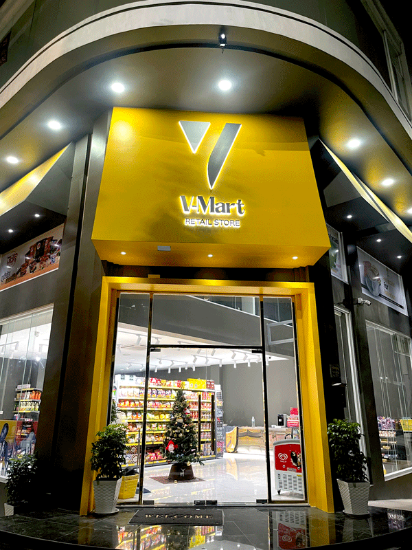 V Mart retail storefront signage by Capital Arts
