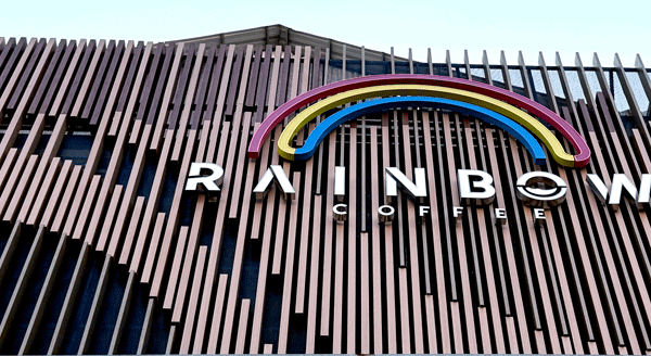 Rainbow coffee signage by Capital Arts